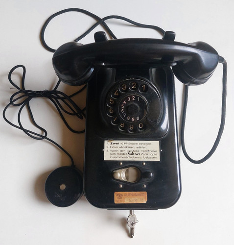 Altes telefon münztelefon - telefon,